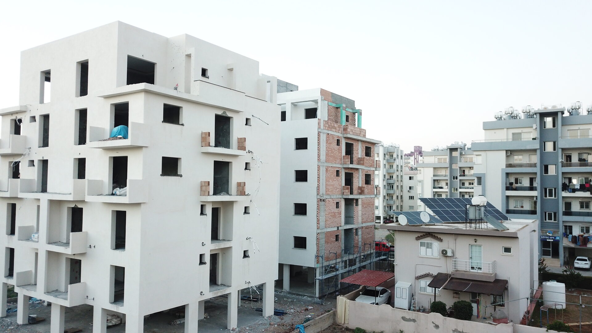 Saffron — plastered block and brick block, viewed from street level